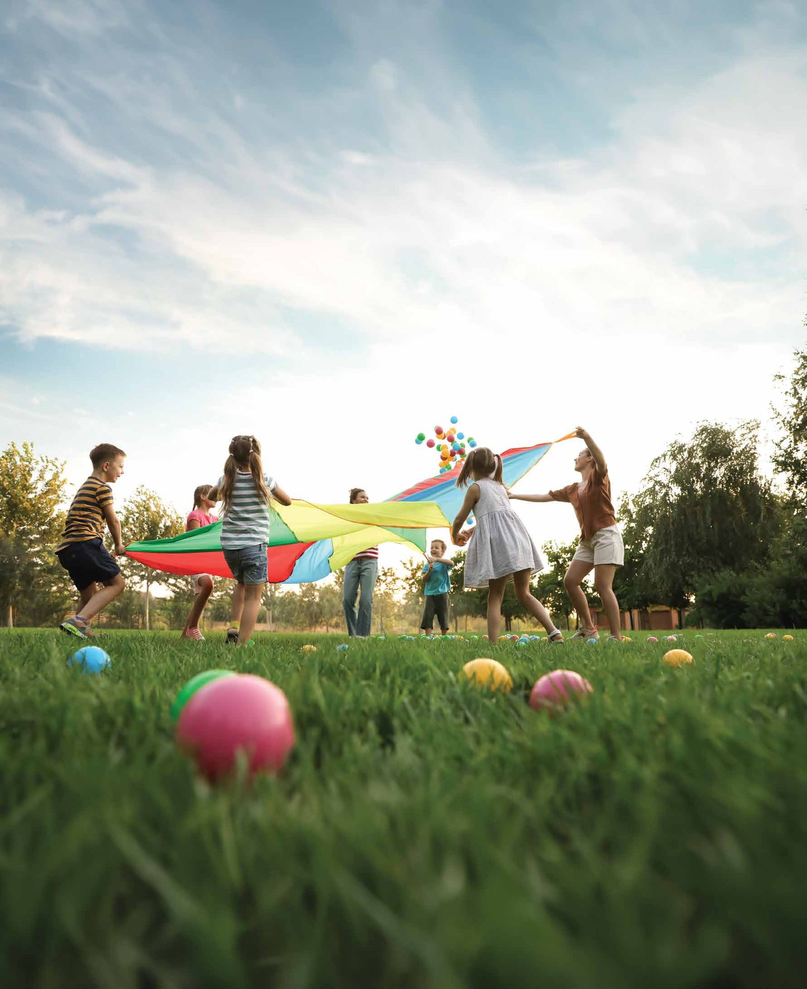 Children playing on the activity lawn