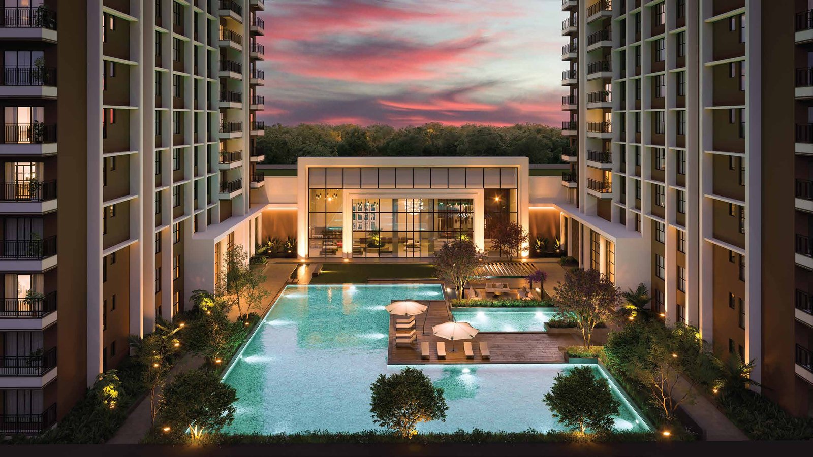 The clubhouse and pool deck at dusk